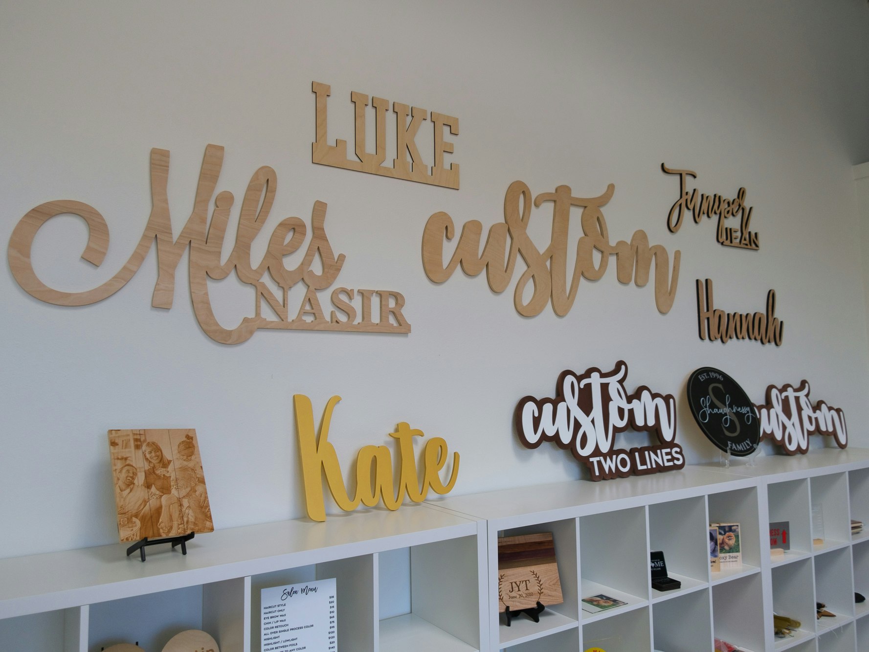 Wall of sample wood and acrylic signs